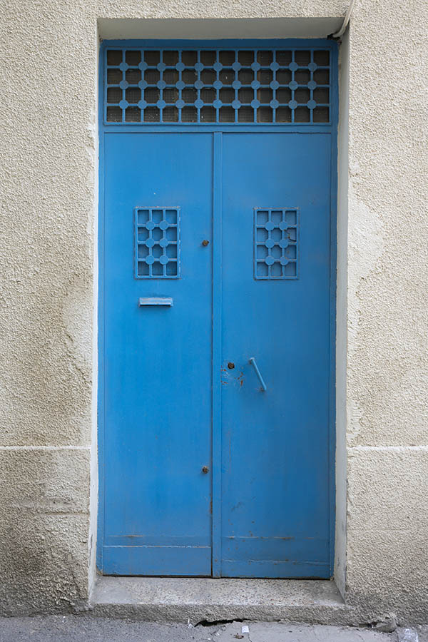 Photo 24595: Narrow, light blue metal plate double door with barred door lights and top window