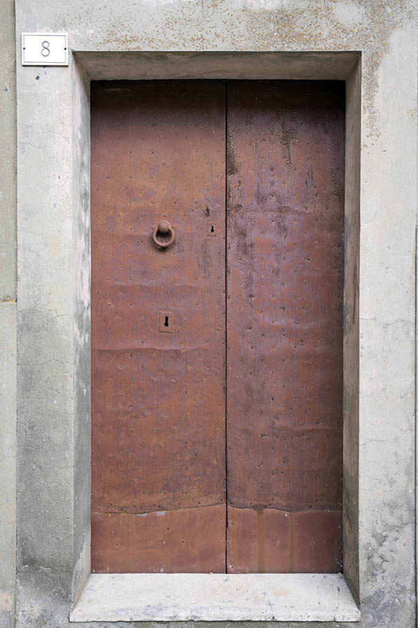 Photo 24647: Worn, red or brown double door of boards