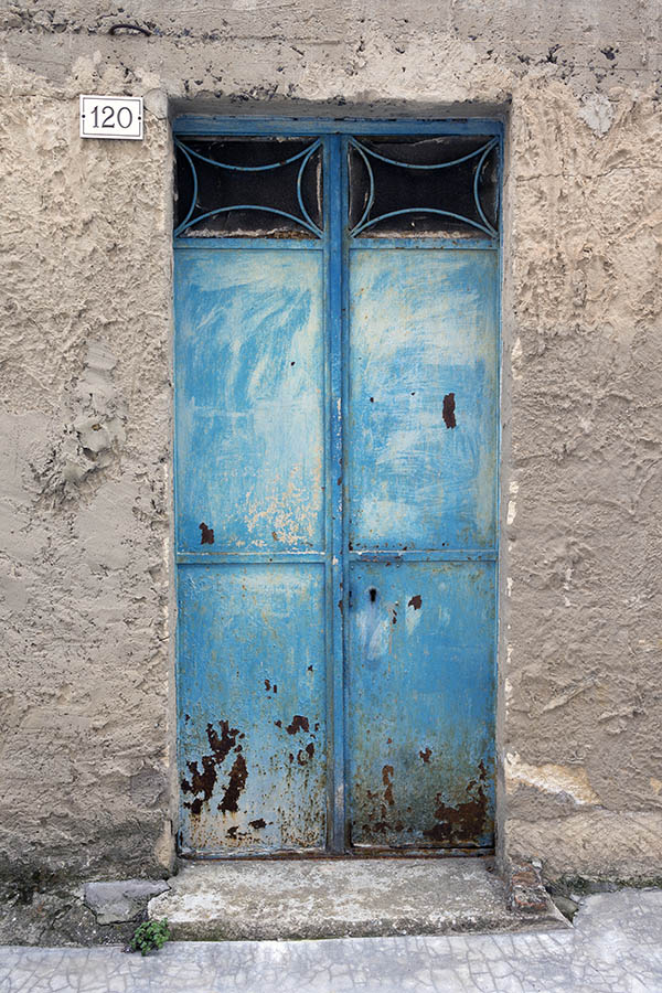 Photo 24665: Decayed, light blue and white metal plate double door with latticed door lights