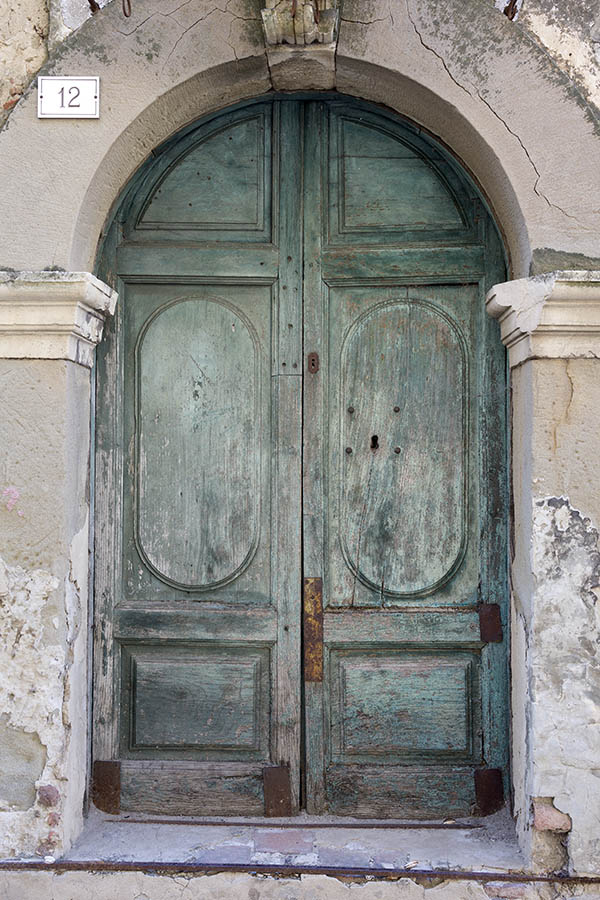 Photo 24690: Worn, panelled, carved, green gate
