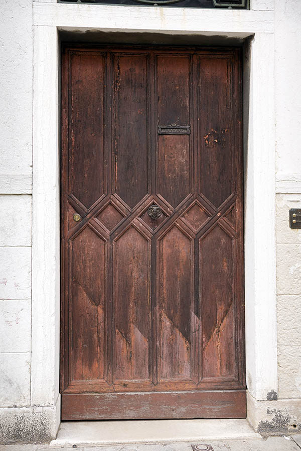 Photo 24843: Panelled, pink and unpainted, carved door