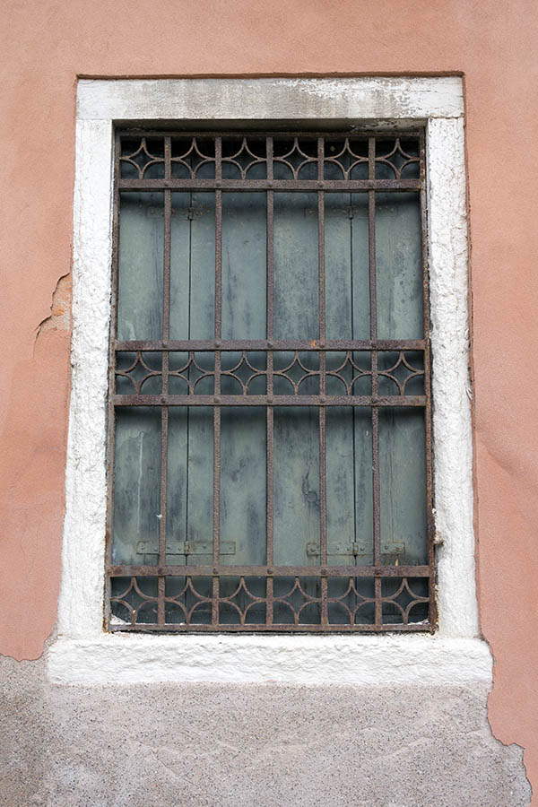 Photo 24877: Barred window with teal shutters