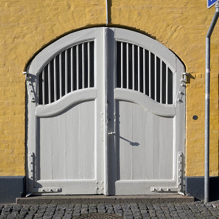 Photo 25028: Formed, panelled, white gate with large, barred door lights