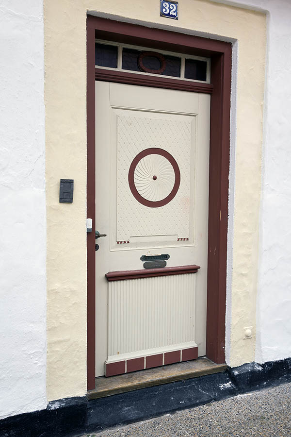 Photo 25060: Panelled, carved, light yellow and brown door with top window