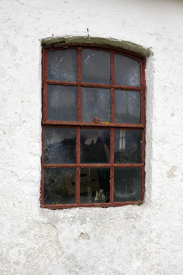 Photo 25190: Formed, rusty, brown metal stable window with two frames and 12 panes
