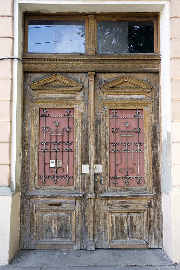 Photo 25694: Worn, panelled, carved, unpainted, brown gate with top window