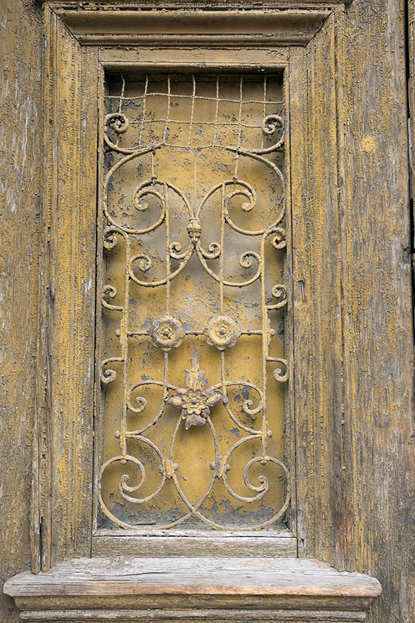 Photo 25747: Worn, yellow, latticed trapdoor