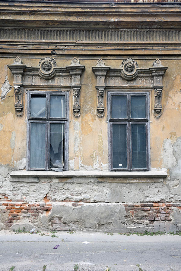 Photo 25751: Facade with two lopsided, brown windows