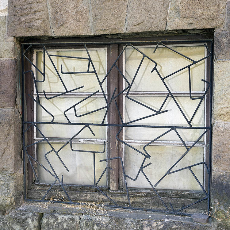 Photo 25974: Decayed, latticed, brown window with two frames and six panes
