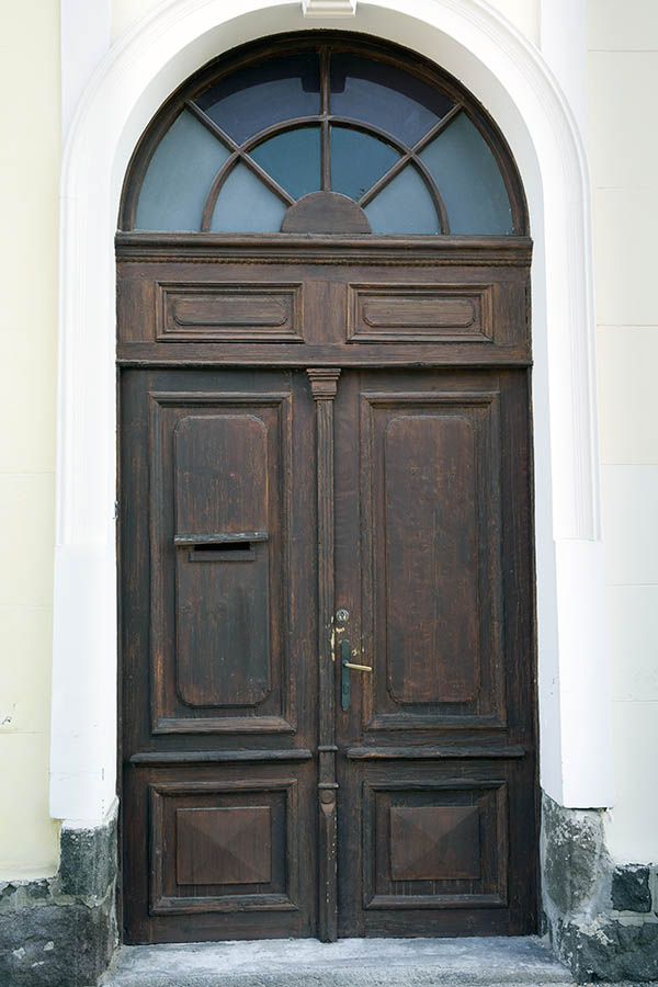 Photo 25976: Panelled, carved, oiled double door with large fan light