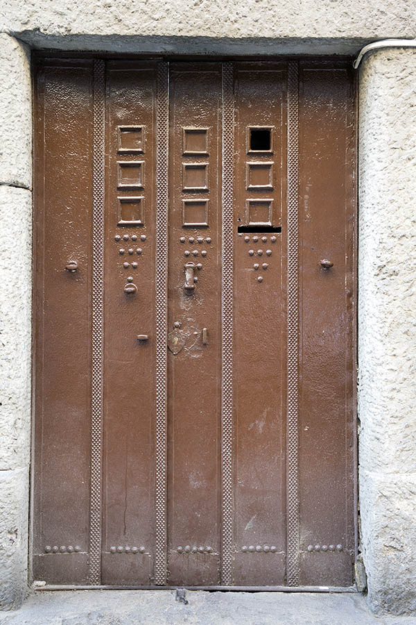 Photo 26099: Brown metal door with nails and decoration