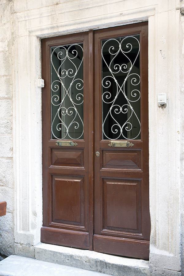 Photo 26294: Panelled, brown double door with latticed door lights