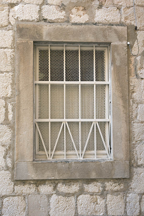 Photo 26299: White, latticed, barred window