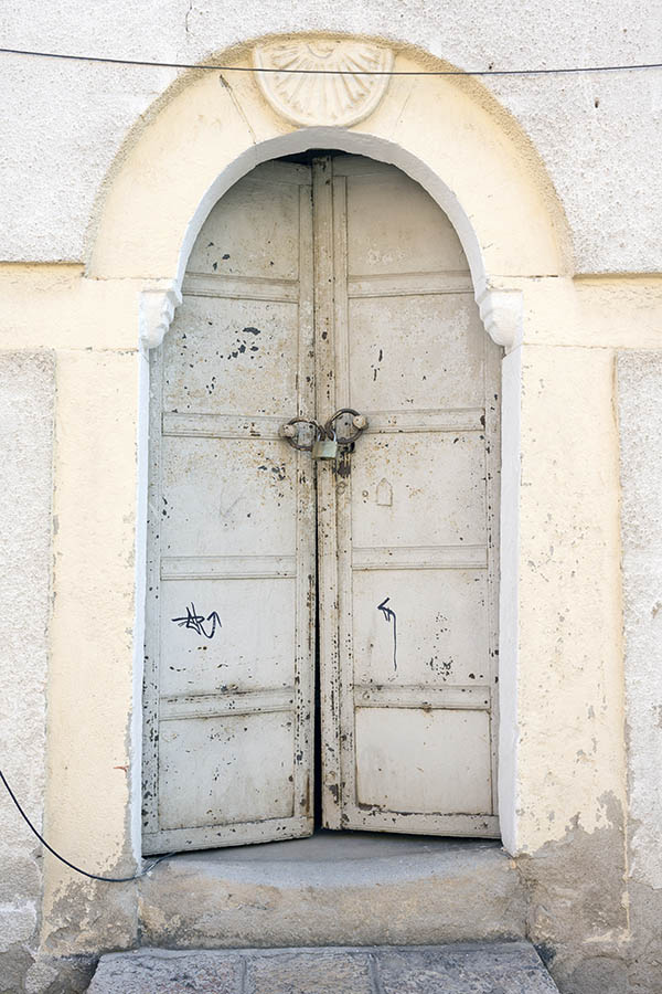 Photo 26371: Worn, panelled, white double door