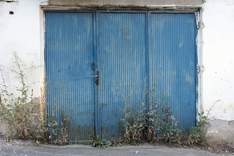 Photo 26418: Worn, rusty, light blue gate in three sections