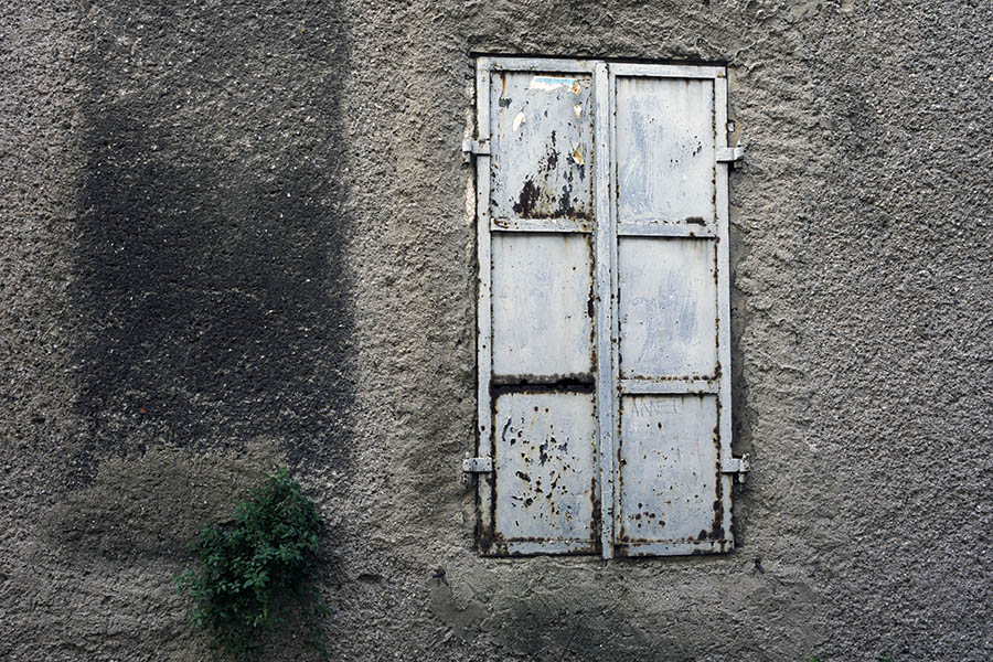 Photo 26480: Decayed, white metal shutters