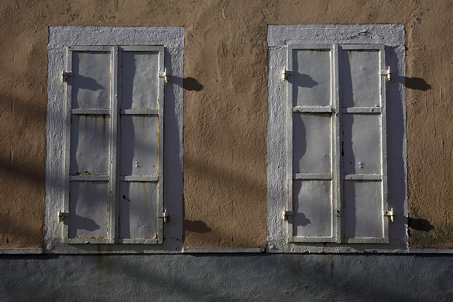 Photo 26500: Two white, double metal shutters