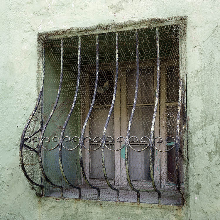 Photo 26509: Grated, latticed, white window