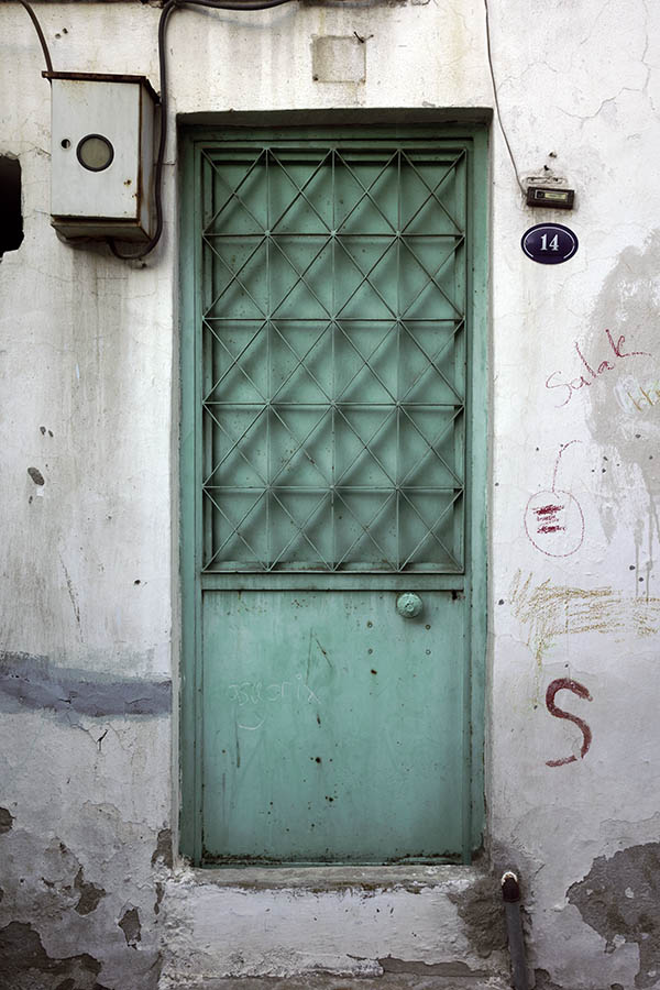 Photo 26563: Light green metal door with lattice