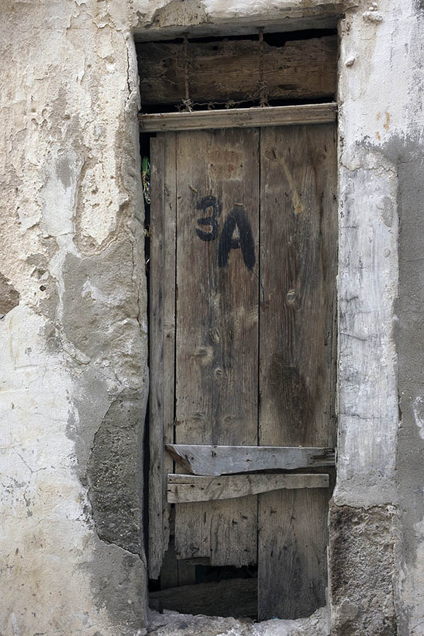 Photo 26591: Unpainted, narrow door of boards