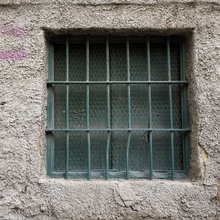 Photo 26652: Green, grated withdow with shutters