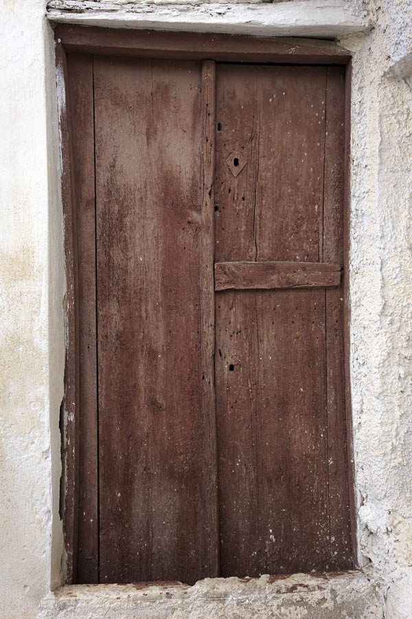 Photo 26705: Worn, brown double door of boards