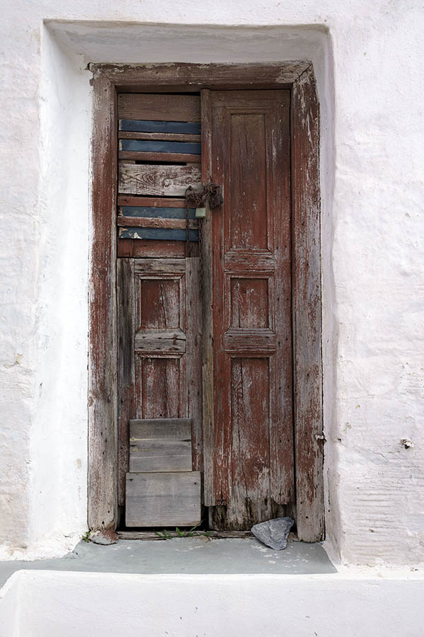 Photo 26713: Decayed and red, unpainted, panelled double door