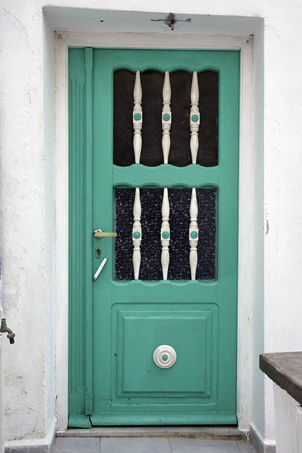 Photo 26735: Light green, panelled door with wooden grating