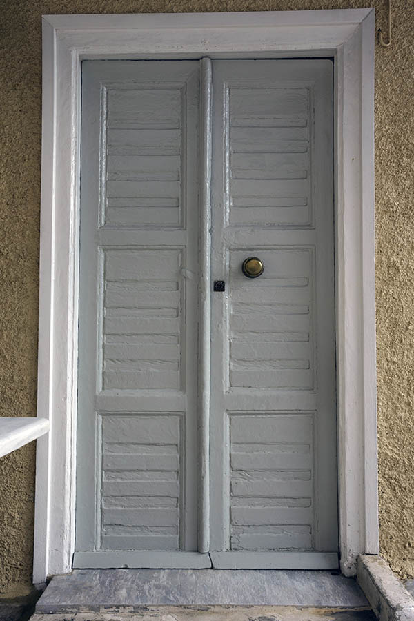 Photo 26753: Narrow, grey, panelled double door in a white frame