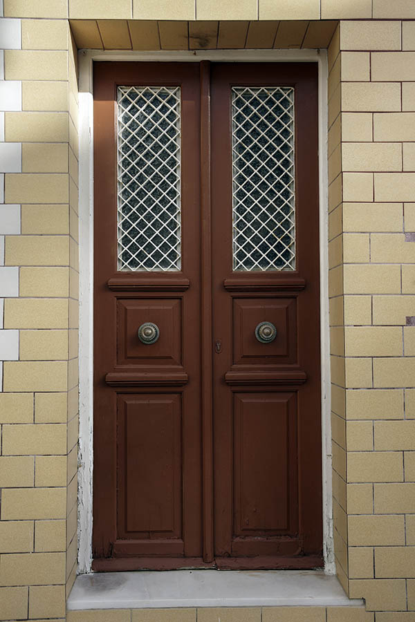 Photo 26807: Brown, panelled double door with white lattice