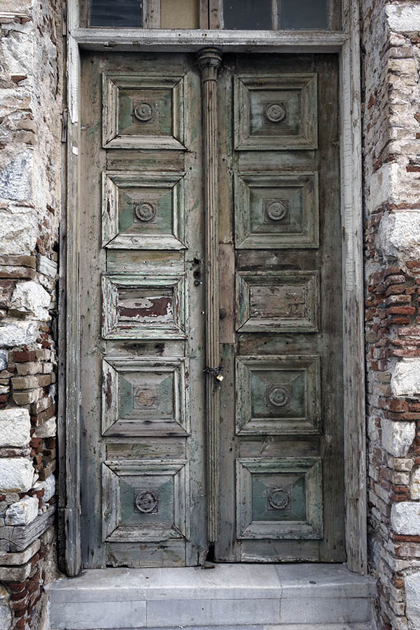 Photo 26821: Decayed, unpainted and light green, panelled double door with top window