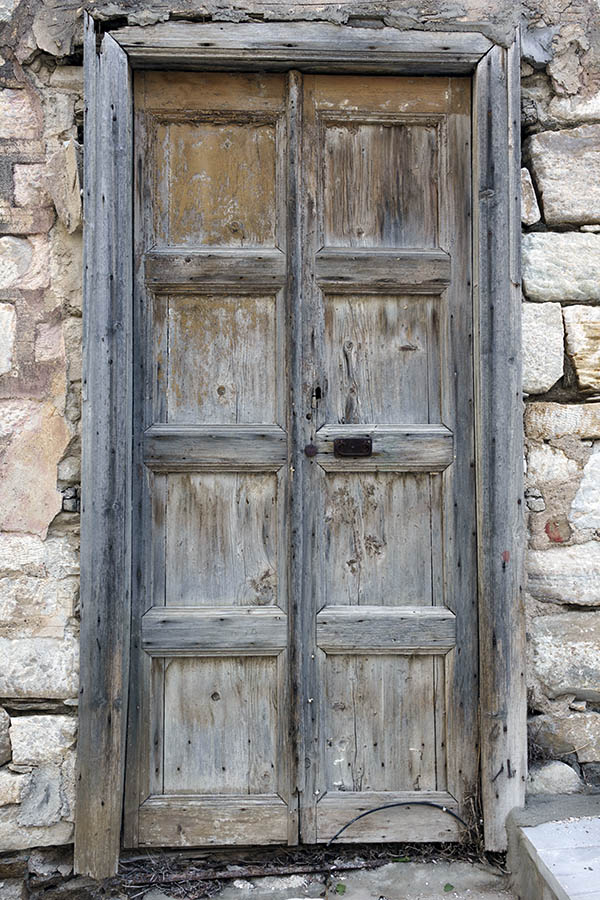 Photo 26844: Decayed, unpainted, panelled double door