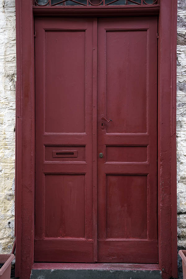 Photo 26898: Deep red, panelled double door with top latticed window
