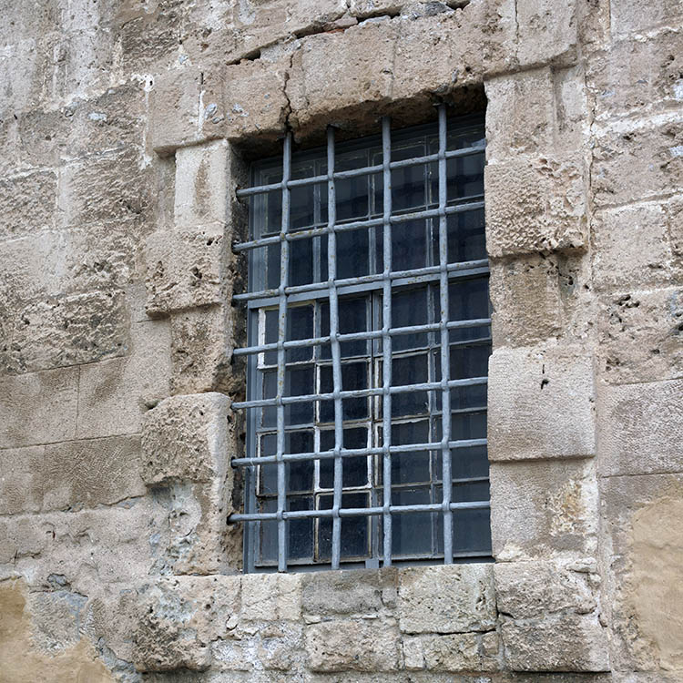 Photo 26907: Teal window with 24 panes and grey grating