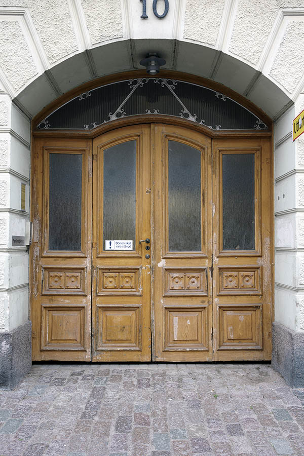 Photo 26979: Light brown gate with fan light. Formed double doors with door lights.