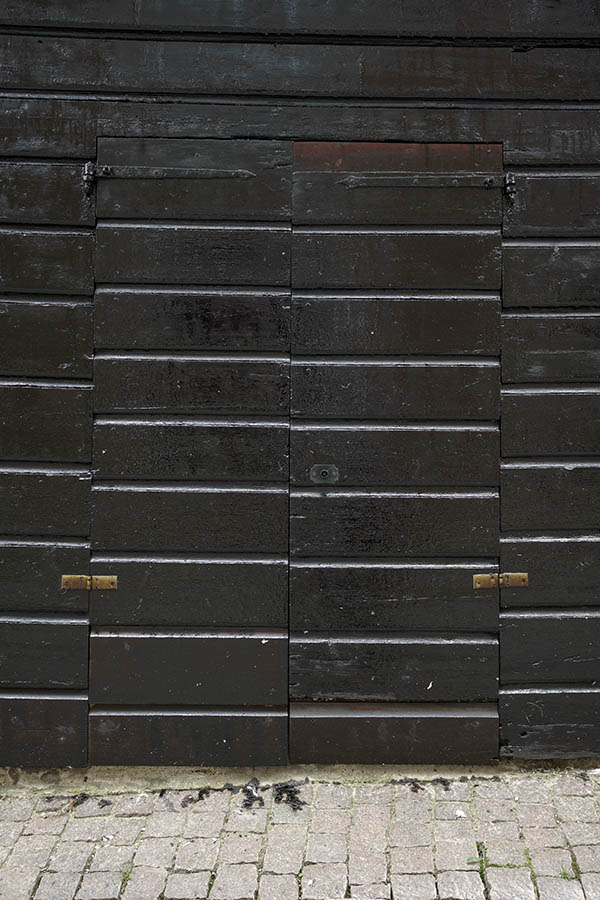 Photo 27077: Black double door of boards