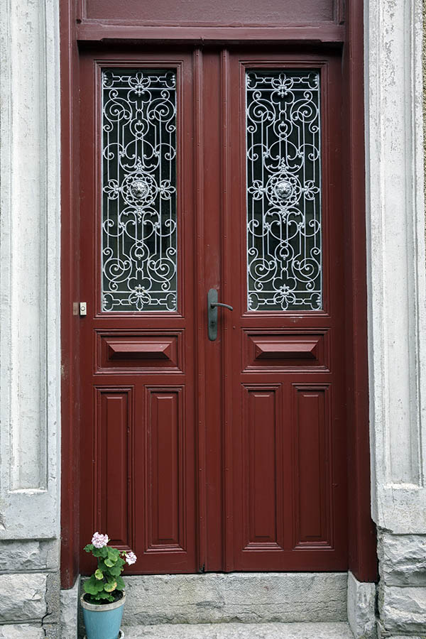 Photo 27083: Panelled, red double door with white lattice