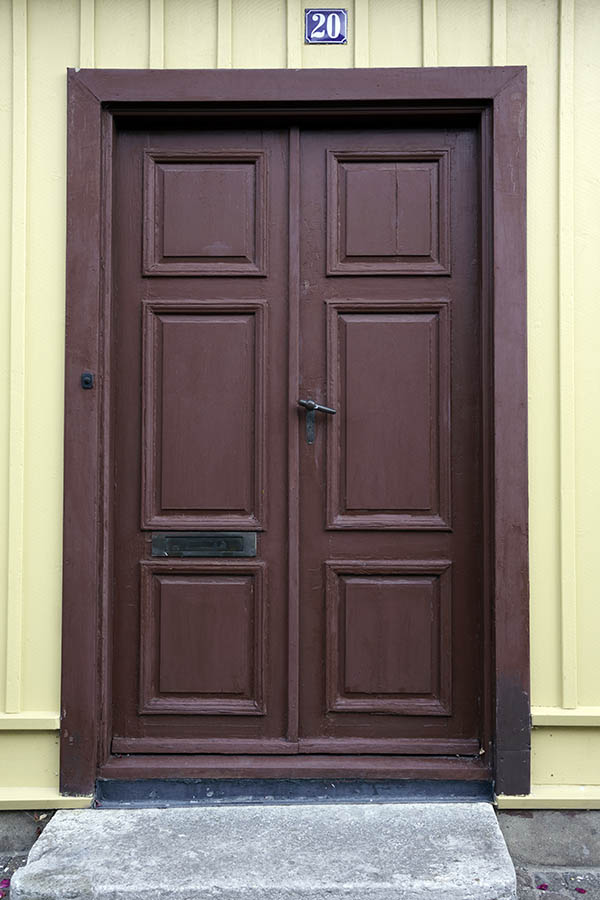 Photo 27123: Worn, brown, panelled double door 