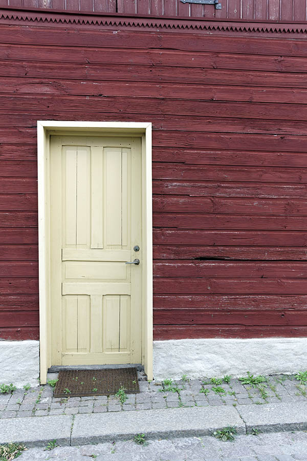 Photo 27127: Worn, yellow, panelled door