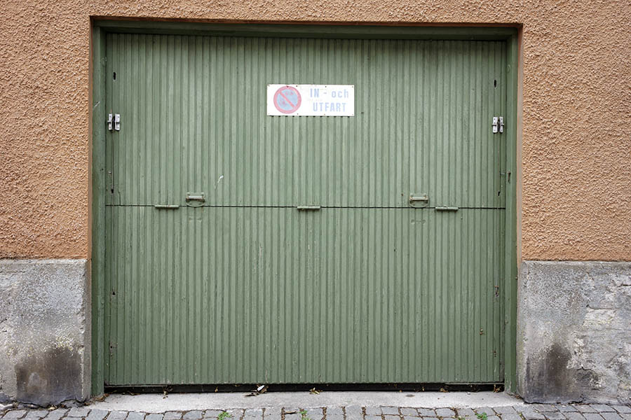 Photo 27198: Green garage door of boards