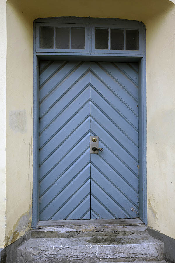 Photo 27216: Light blue double door of boards in diagonal with top window
