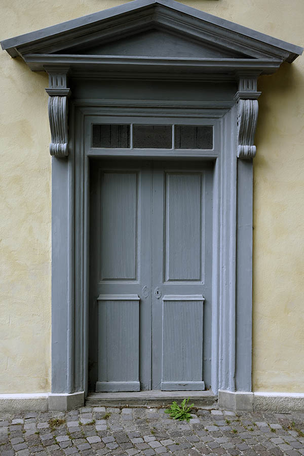 Photo 27287: Grey, panelled double door with top window and large, carved pilastre