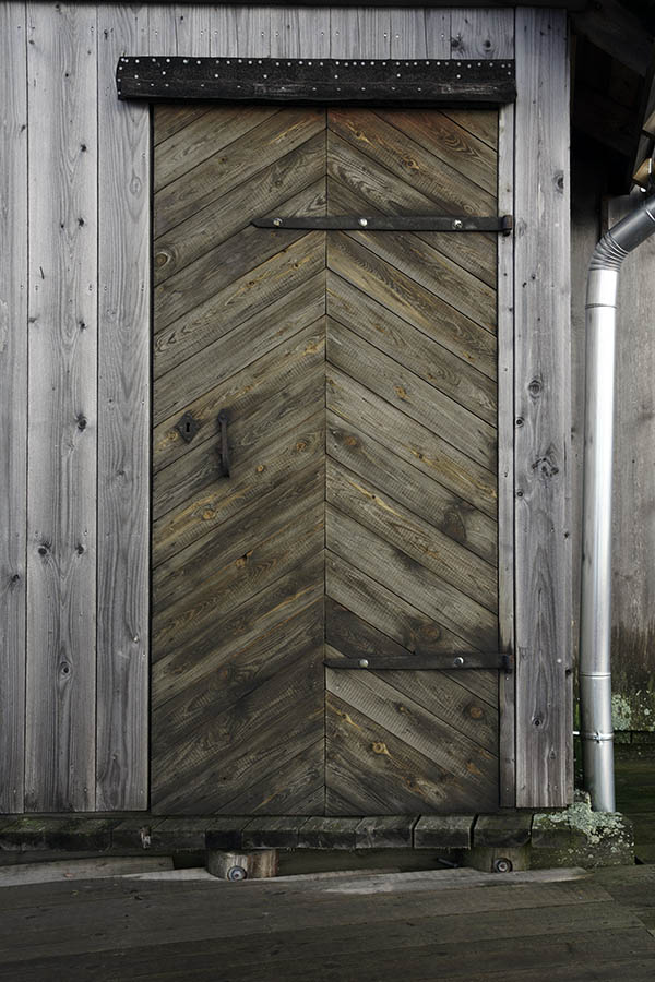 Photo 27346: Unpainted door of diagonal boards