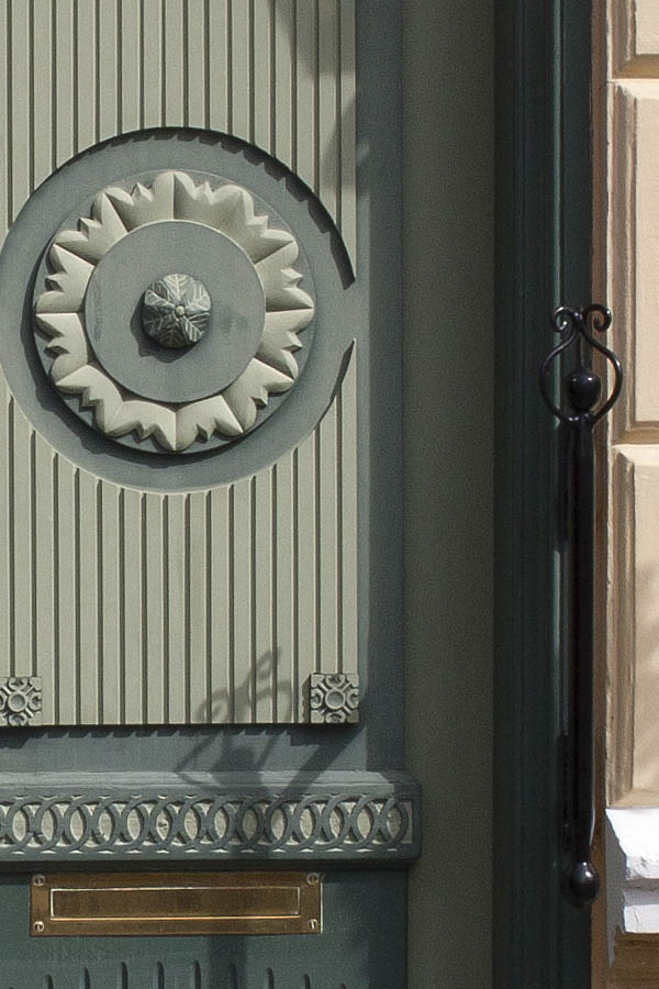 Photo 00449: Panelled, carved, teal and green double door with top window