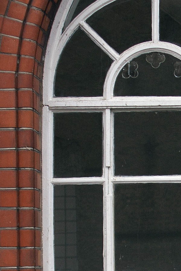 Photo 01397: Large, white, formed window with 44 panes