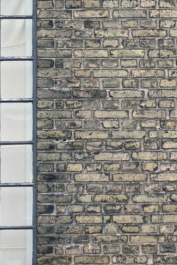 Photo 01401: Two large, formed, black metal windows