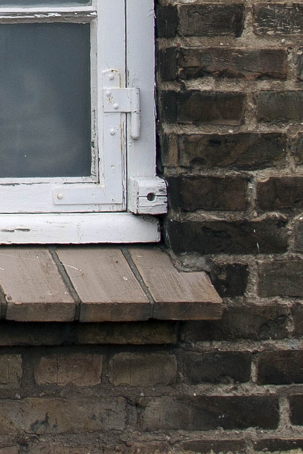 Photo 01416: Formed, white window with four frames and 24 panes