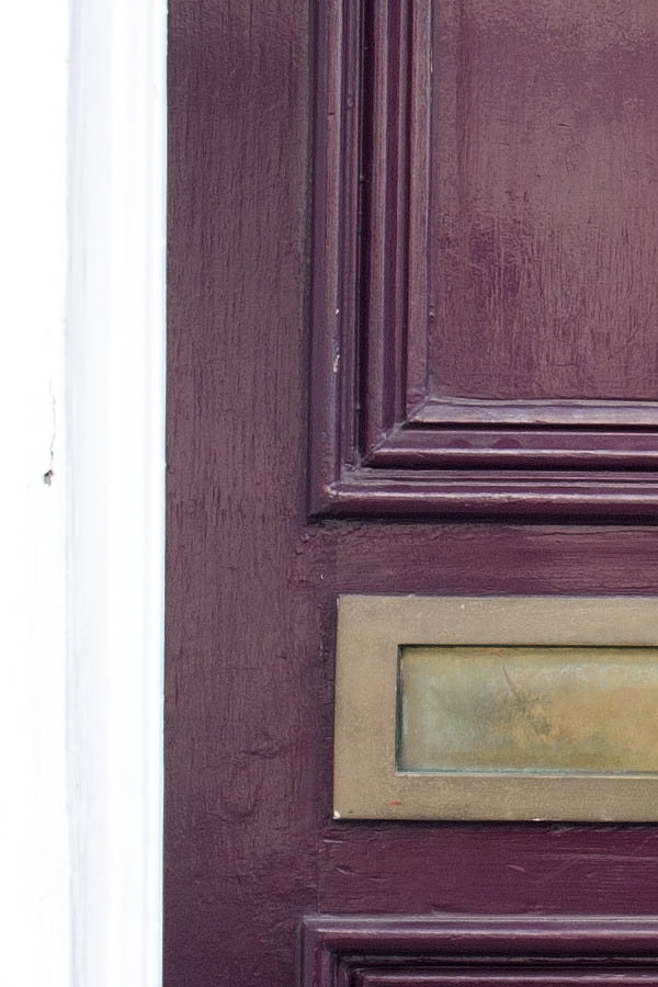 Photo 01524: Panelled, purple door with top window