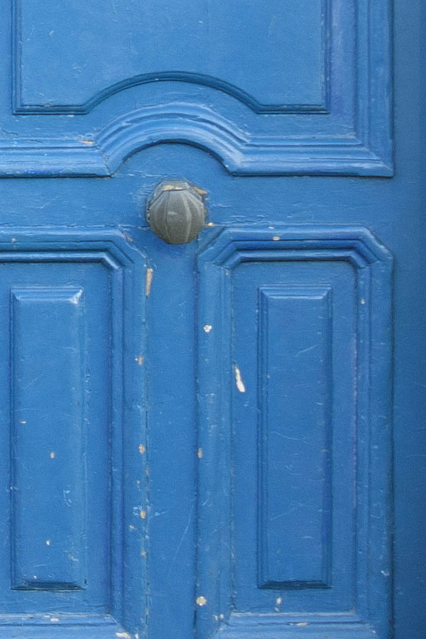 Photo 02153: Worn, panelled, light blue double door with fan light
