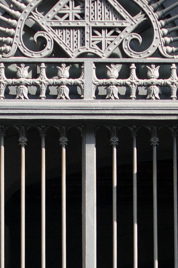 Photo 02382: Large, formed, grey cast iron gate